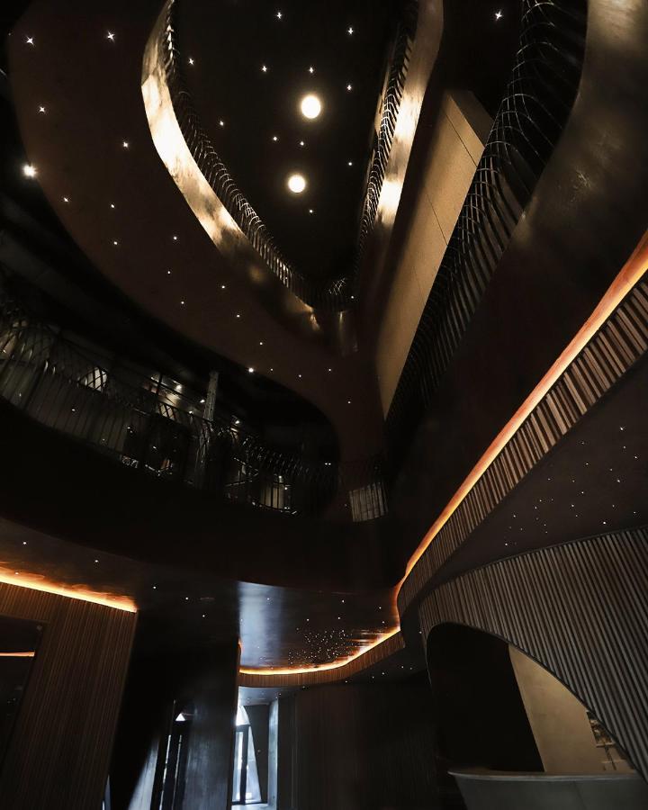 The Veil Hotel アスターナ エクステリア 写真 The interior of the new building