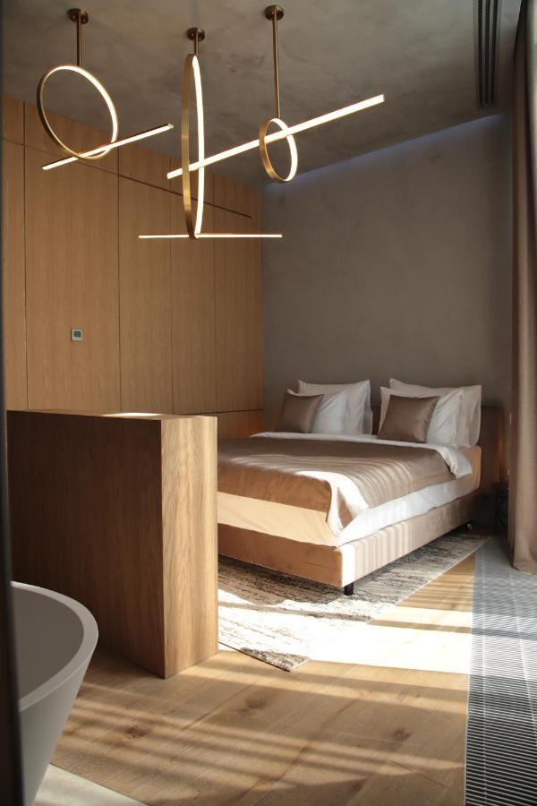The Veil Hotel アスターナ エクステリア 写真 A bedroom at the hotel